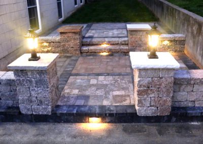 patio selections center lit night grey concrete stonework masonry purple hue