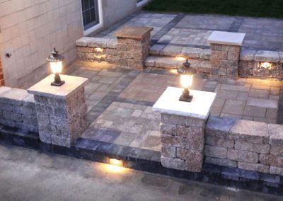 patio selections center lit night grey concrete stonework masonry