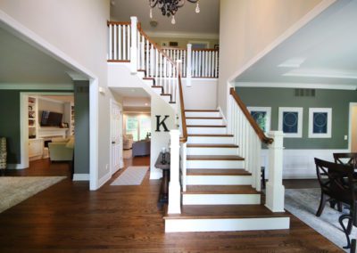 updated wooden staircase custom woodwork carpentry trim full home remodel