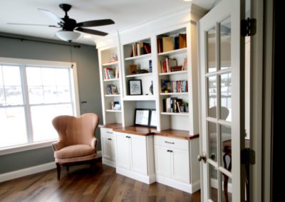 home office custom bookshelves wood lake view