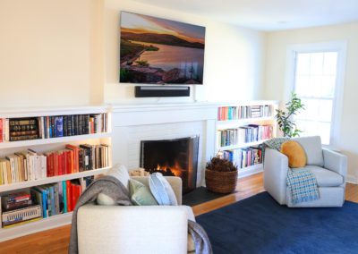 fireplace with built-in bookshelves