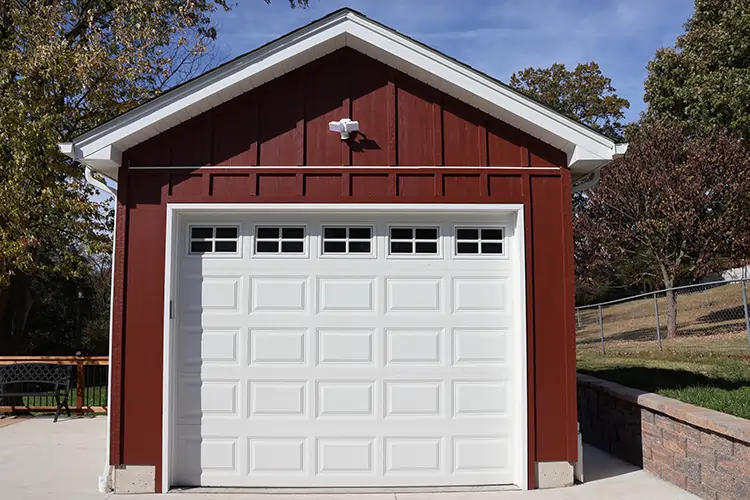 Facade view of a garage add-on project by Agape Construction.