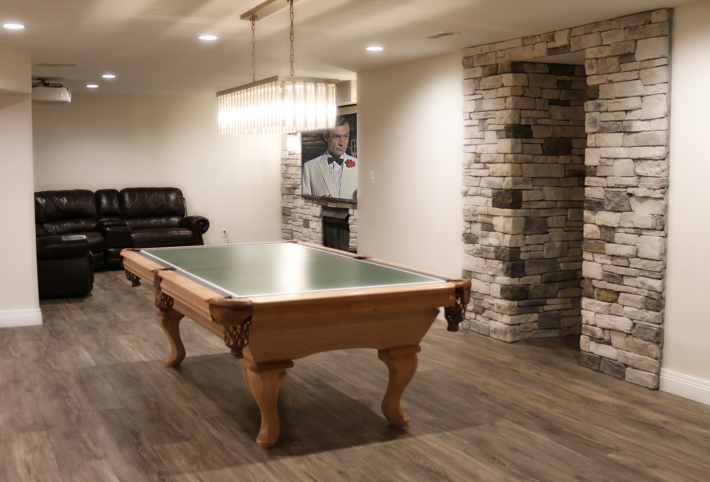 finished basement features theater area and game room