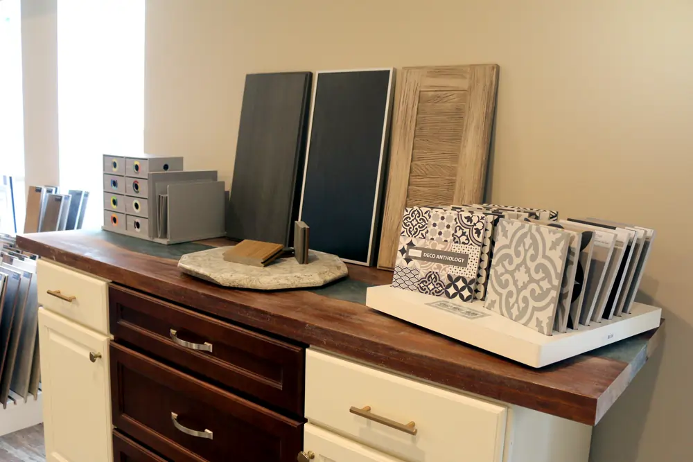 samples cabinet tiles at Agape Construction Kirkwood Design Center