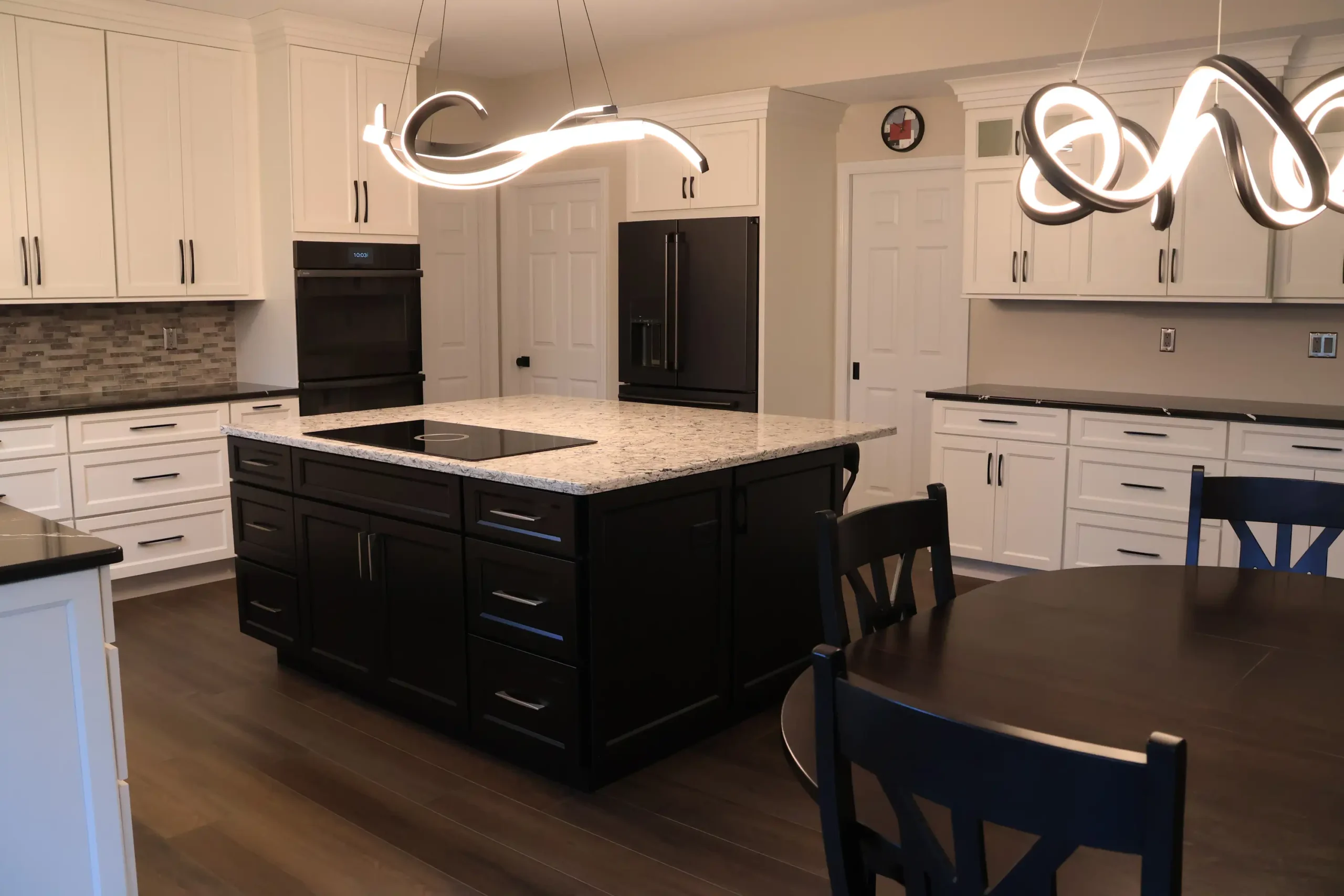 2025-home-design-trends-lighting-as-art-agape-construction-st-louis artistic lighting in kitchen