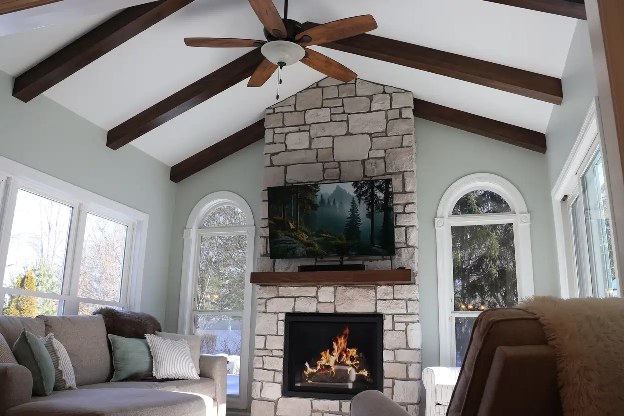 hearth room floor to ceiling stone fireplace