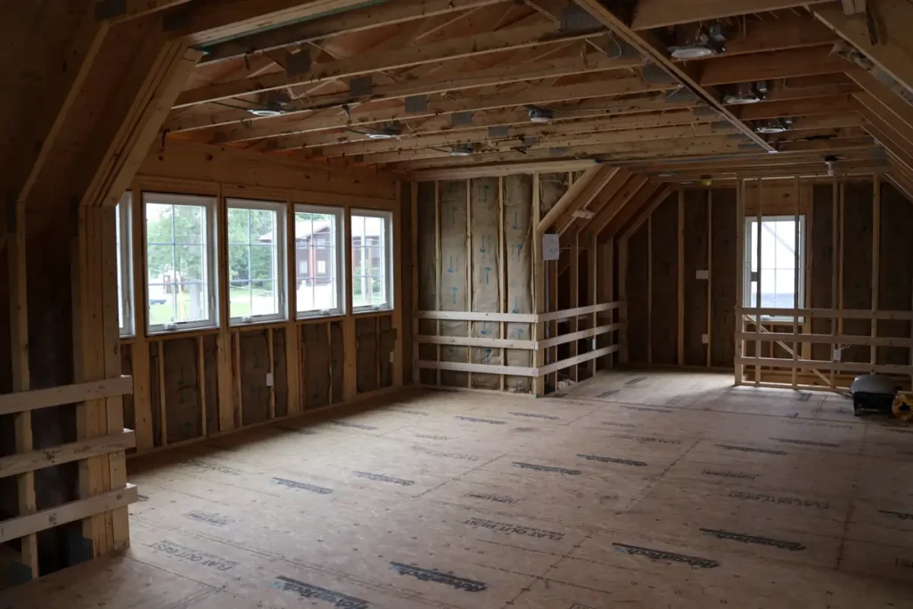 unfinished attic apartment in carriage house