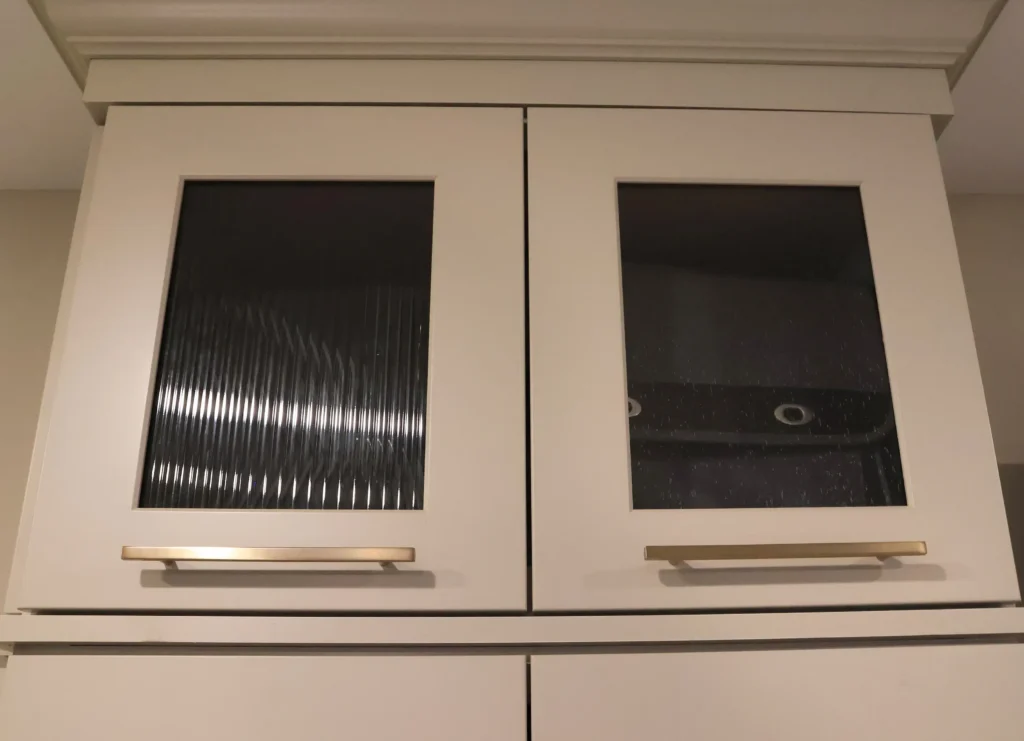 samples of glass cabinet face at Agape Kirkwood showroom
