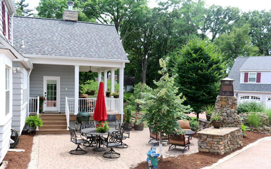 back patio red umbrella stone masonry garden living