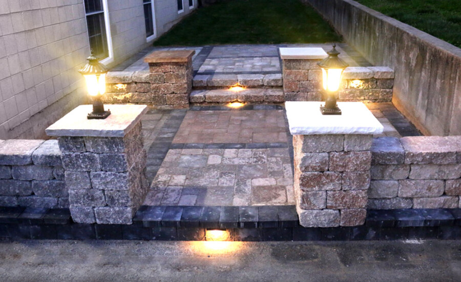 patio selections center lit night grey concrete stonework masonry purple hue