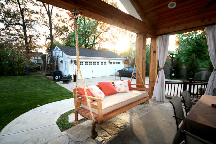 handcrafted wooden swinging bench