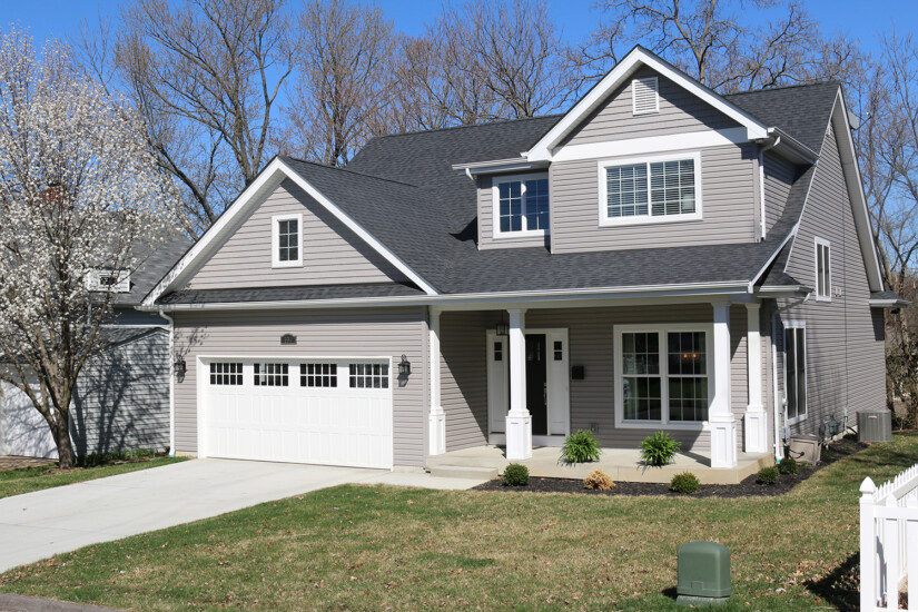 A new home build by Agape Construction of Chesterfield and Kirkwood, MO, featuring driveway and integrated garage.