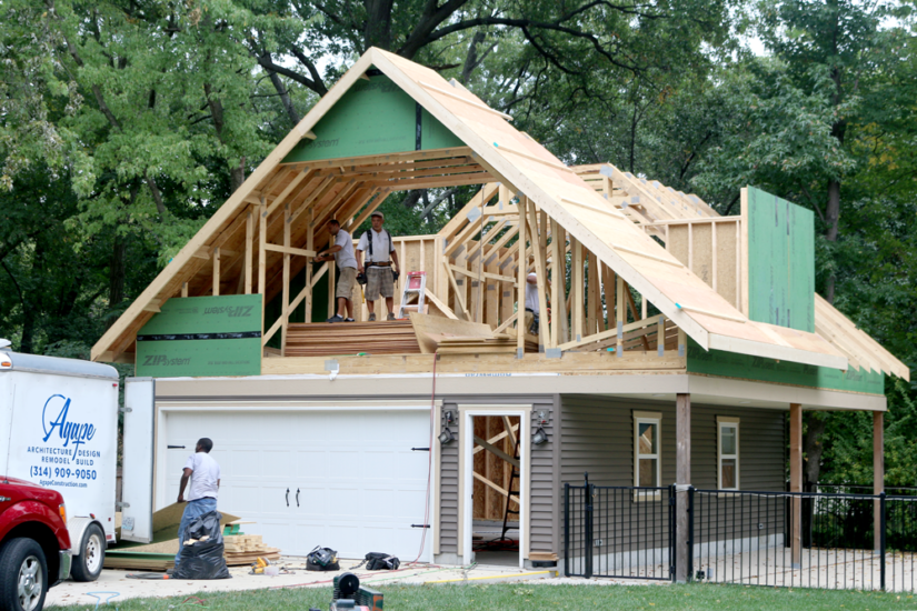 house under construction scaffolding