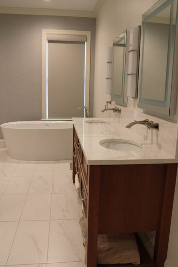 double vanity and soaker tub primary bath