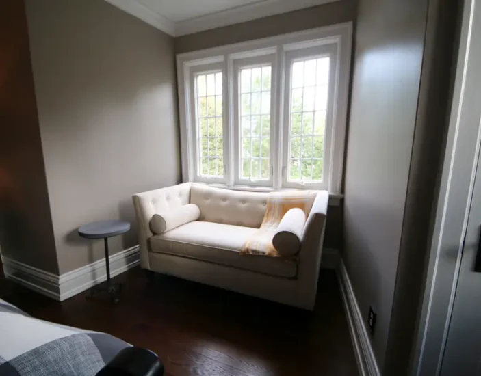 A post-renovation reading nook, designed for comfort, by Agape Construction.