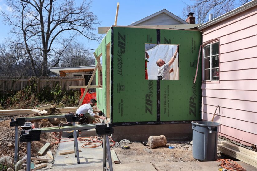 Agape construction crew building sunroom addition
