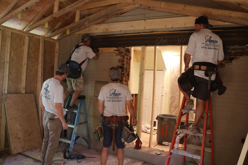 Agape Construction crew removing exterior wall