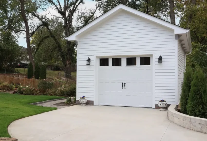 New, oversized single garage with new driveway, by Agape Construction.