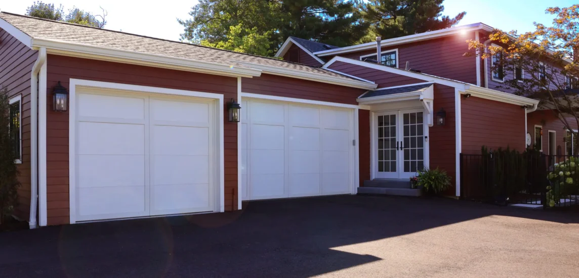 A 3-car garage addition to an existing St. Louis, MO, home. By Agape Construction.