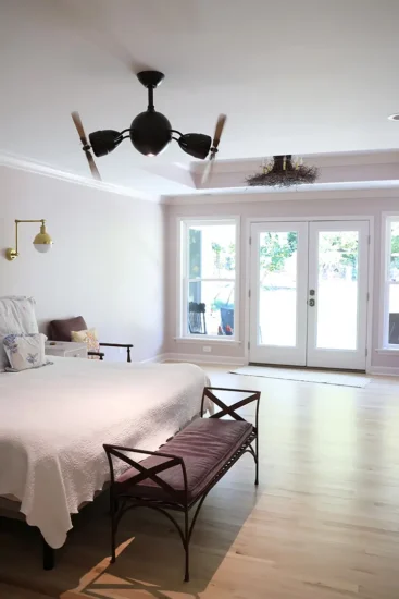 A primary bedroom suite, completed by Agape Construction.