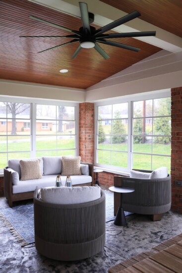 sunroom addition with living and dining area