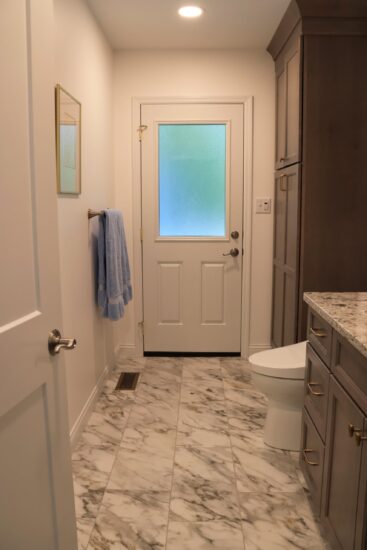 hall bath remodel with new door to pool