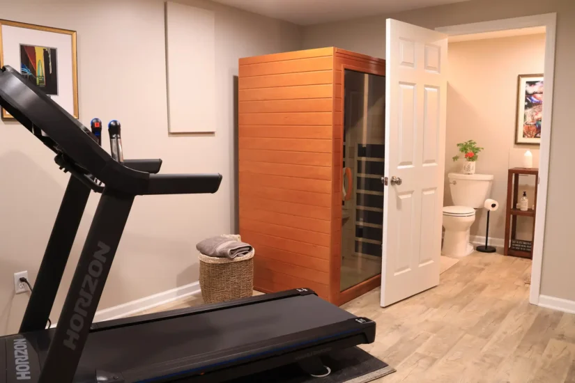 basement remodel includes fitness studio and bathroom