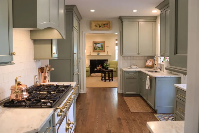 timeless green kitchen open to hearth room