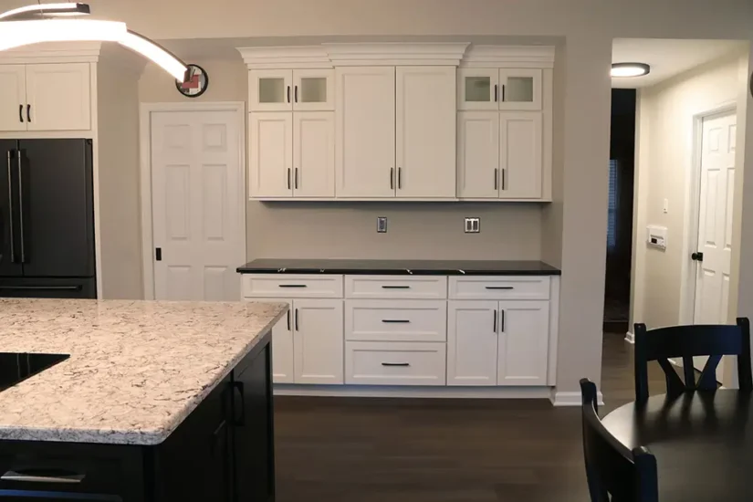 large black and white kitchen with artistic lighting