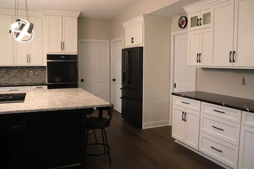 large black and white kitchen with artistic lighting