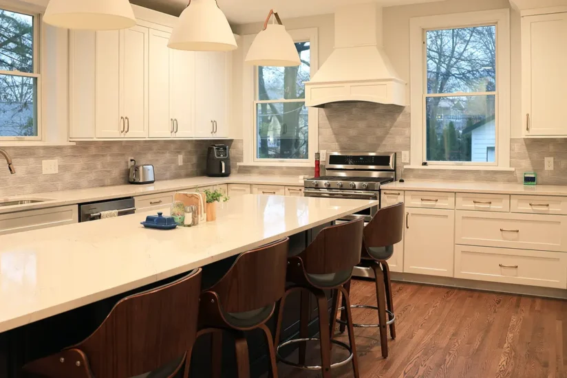 kitchen addition with two toned blue and white cabinetry