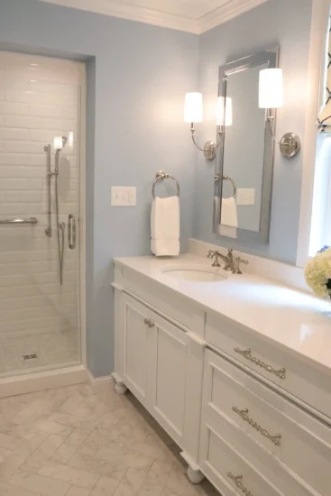 white and blue primary bath