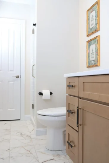 guest bath light wood cabinetry