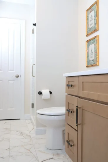 guest bath light wood cabinetry