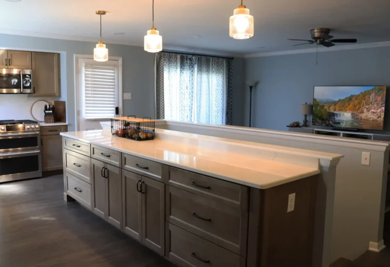 open concept kitchen with natural wood cabinetry