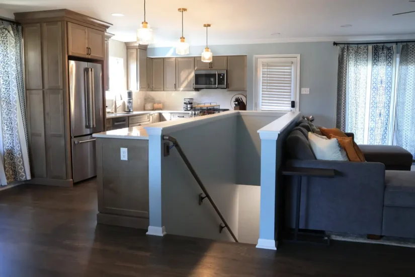 open concept kitchen with natural wood cabinetry