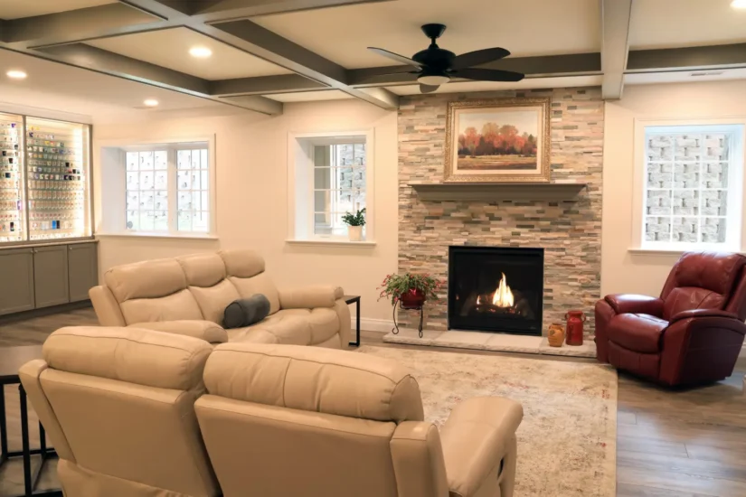 stone surround fireplace in finished basement