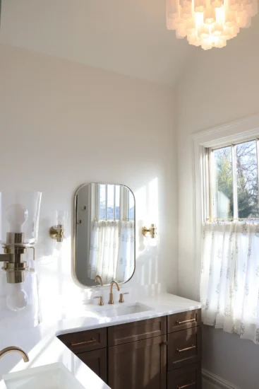 vanity with decorative light primary bath