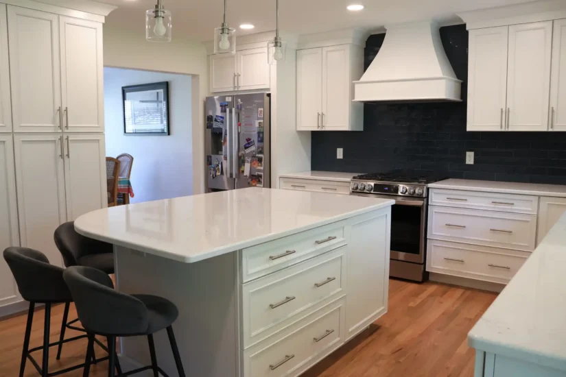 updated white kitchen by Agape with blue tile